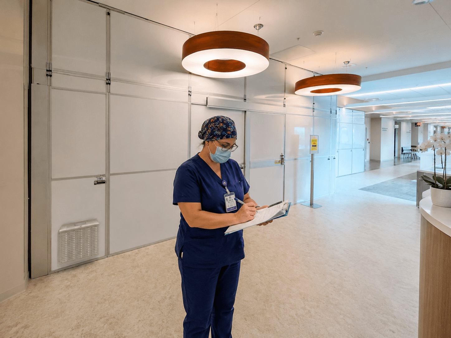 TWS Dust Containment & Mitigation — modular containment wall installed in an occupied hospital corridor